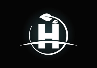 Initial H monogram alphabet with circle leaf and swoosh. Eco-friendly logo concept. Font emblem. Modern vector logo for ecological business and company identity
