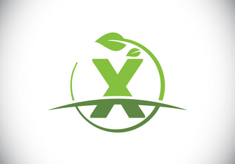 Initial X monogram alphabet with circle leaf and swoosh. Eco-friendly logo concept. Font emblem. Modern vector logo for ecological business and company identity