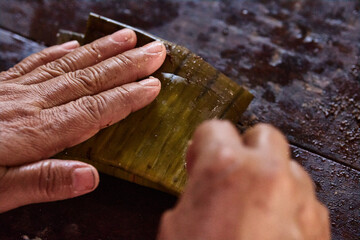 Documentary photography preparation of Oaxacan mole in Mexico, in a traditional way. Oaxacan tamales. Mexican food. Latin food. Spicy food.