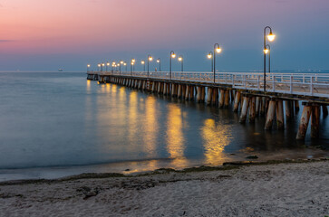 Baltic sea coast, morning view of pier at Gdynia Orlowa sea resort, Poland.