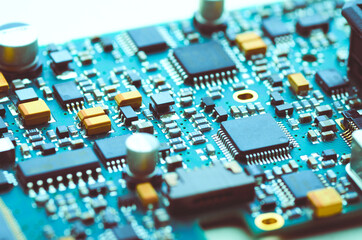 Modern electronic board with microchips and electronic parts close-up