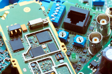 Disassembled electronic boards with microchips, electronic components and precious metals for...
