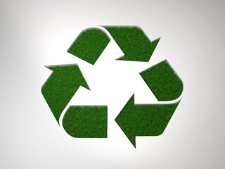 Obraz premium 3d rendering of the recycling symbol made with 3d grass on white background