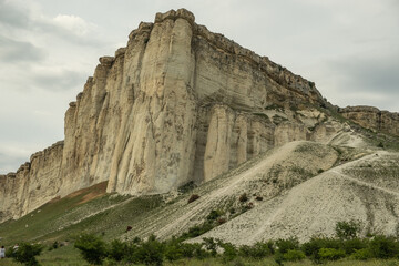 Panorama of the steppe landscape. View from the mountain to the surrounding area. Fields, roads, villages, mountains from a bird's eye view. Day. Summer