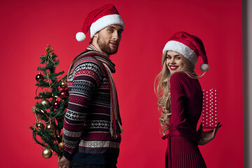 man and woman christmas holiday romance red background