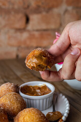 hand holding a cup of coffee