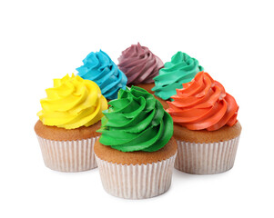 Different delicious colorful cupcakes on white background