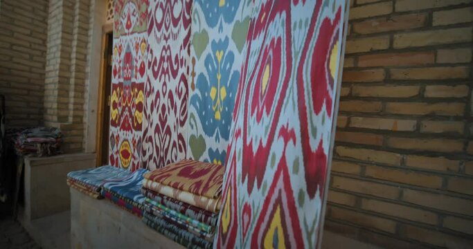 Bukhara Uzbekistan Shopping street Uzbek national silk patterns. Silk road trade.