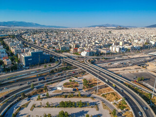 Vehicles elevating one of the most complex roads in Athens, the famous road junction at Faliro, Piraeus. Aerial view over Attica - Greece