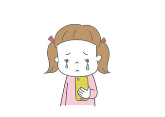 スマートフォンを見て泣いている女の子
