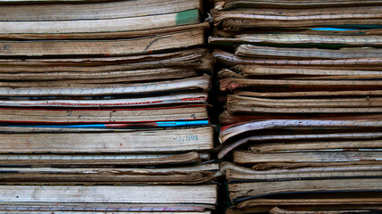 closeup of old books and copy placed in a table. 