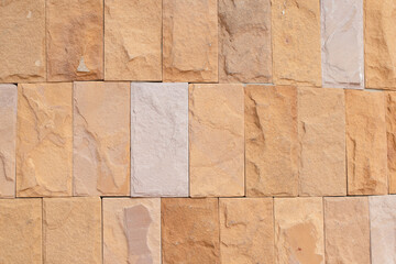 Beautiful abstract close-up abstract sandstone brick wall background texture