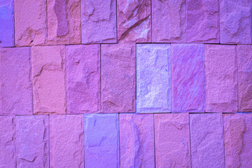 Pink sandstone brick wall background texture close-up beautiful abstract