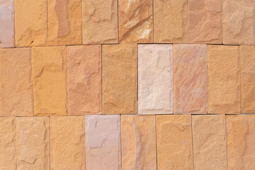 Beautiful abstract close-up abstract sandstone brick wall background texture