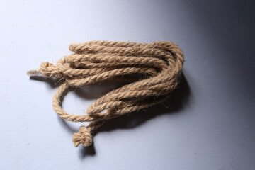 Burlap rope on a white background for crafts