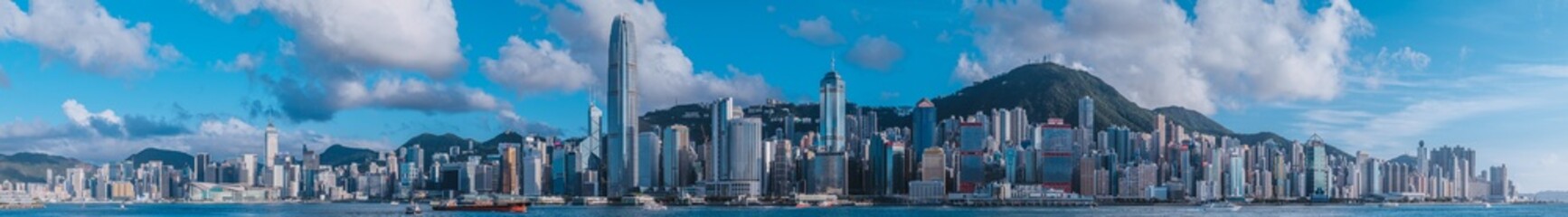 Hong Kong Skyline in West Kowloon Waterfront Promenade - obrazy, fototapety, plakaty