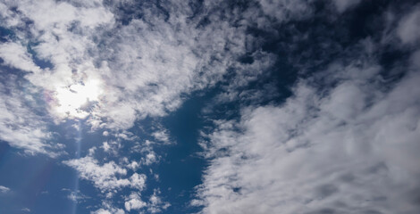 blurred blue sky with clouds and sun in Brazil