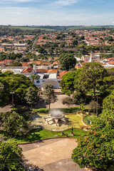 Fototapeta na wymiar Bebedouro, Sao Paulo, Brazil, April 09,2015. Aerial view of city and Barao do Rio Branco square from the tower of the parish church, in downtown of Bebedouro.