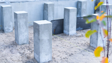 Concrete pillars poured for the construction of the terrace frame