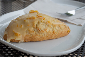 Front view of orange scone
