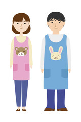 エプロン姿の保育士たち
