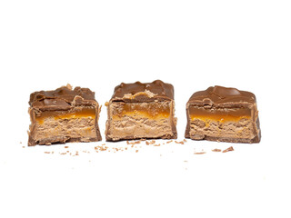 Chocolate bar in a cut on a white background.