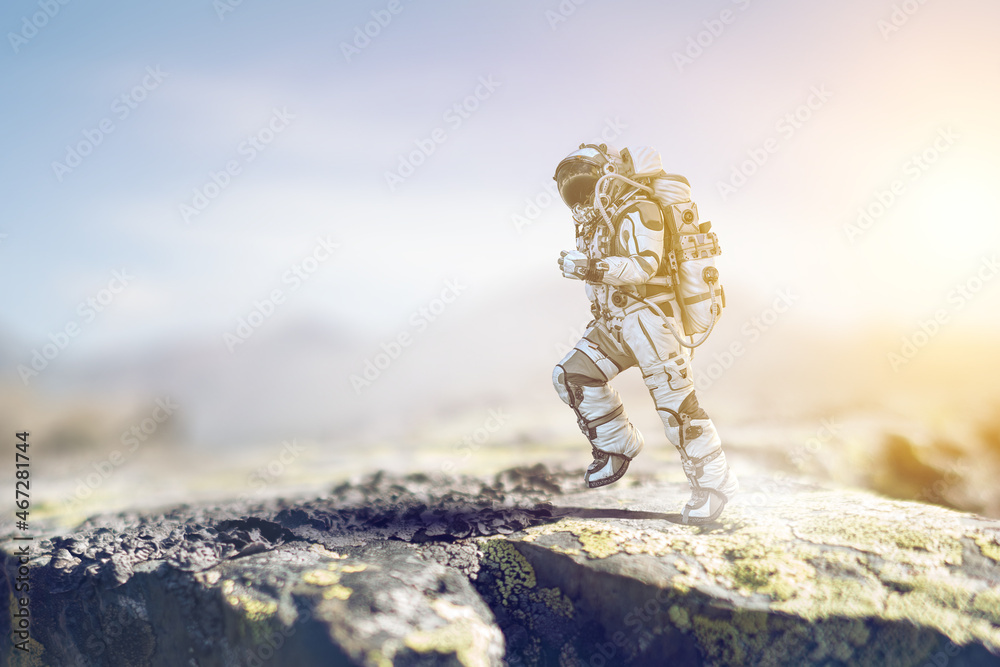 Wall mural astronaut walking on an unexplored planet