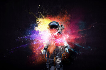 Astronaut in suit against black background. Space technology concept
