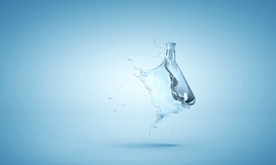 Fototapeta na wymiar Water splash out of glass bottle
