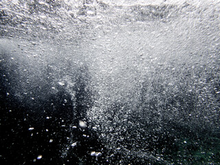 Underwater sea bubbles, bubble wave under the ocean, blue sea water bubble, real picture suitable for background.