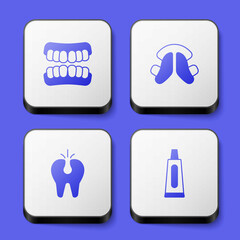 Set Dentures model, Dental tooth plate, Broken and Tube of toothpaste icon. White square button. Vector