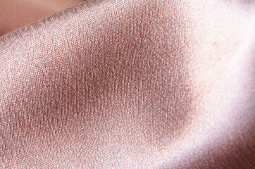 Fototapeta premium Brown satin fabric. Close-up. Chocolate Background