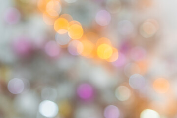 Blurry New Year and Christmas lights. New Year and Christmas festive bokeh. Abstract background