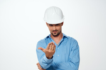 engineer in a white helmet construction industry isolated background