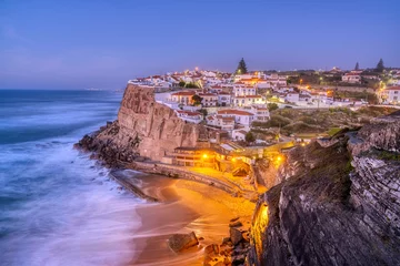 Poster The beautiful village of Azenhas do Mar at the portuguese Atlantic coast after sunset © elxeneize