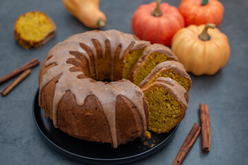 Fresh home made pumpkin bundt cake with cinnamon frosting