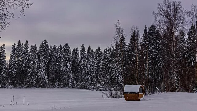 Midnight sunlight timelapse around thermowood cabin stay