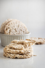 Crunchy buckwheat and rice snack on white background. Health  alternative to conventional wheat bread