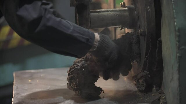 melting plastic at the factory and laying in the conductor under the press