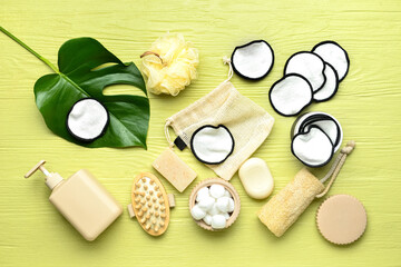 Set of bath supplies on color wooden background