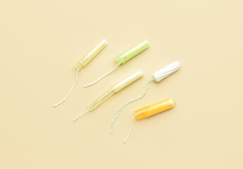 Menstrual tampons on yellow background