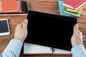 businessman with a tablet, works in the office