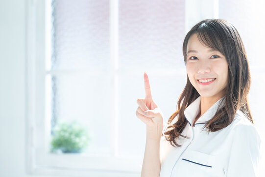 Asian (Japanese) nurse copy space with easy to use nurse image