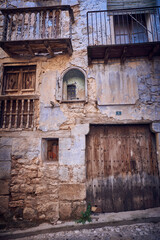  old rural façade with wooden doors and windows