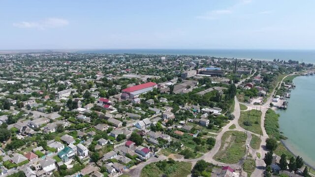 Aerial shot of a large village on Arabat arrow at Black Sea coast in summer