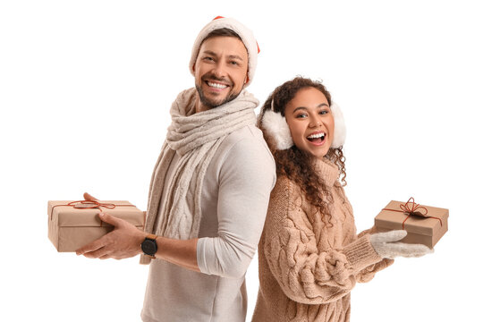 Happy Couple With Christmas Gifts  On White Background