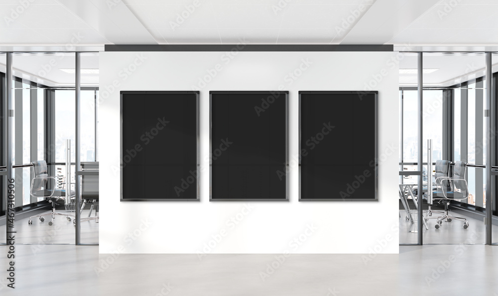 Poster three vertical frames mockup hanging on wall. mock up of billboards in modern concrete office interi