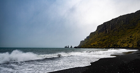waves crashing on a rock