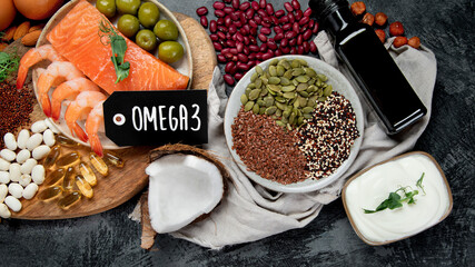 Assortment of omega 3 best sources on dark background.