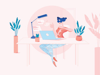 Woman digital freelancer works in a nicely decorated modern office on a laptop